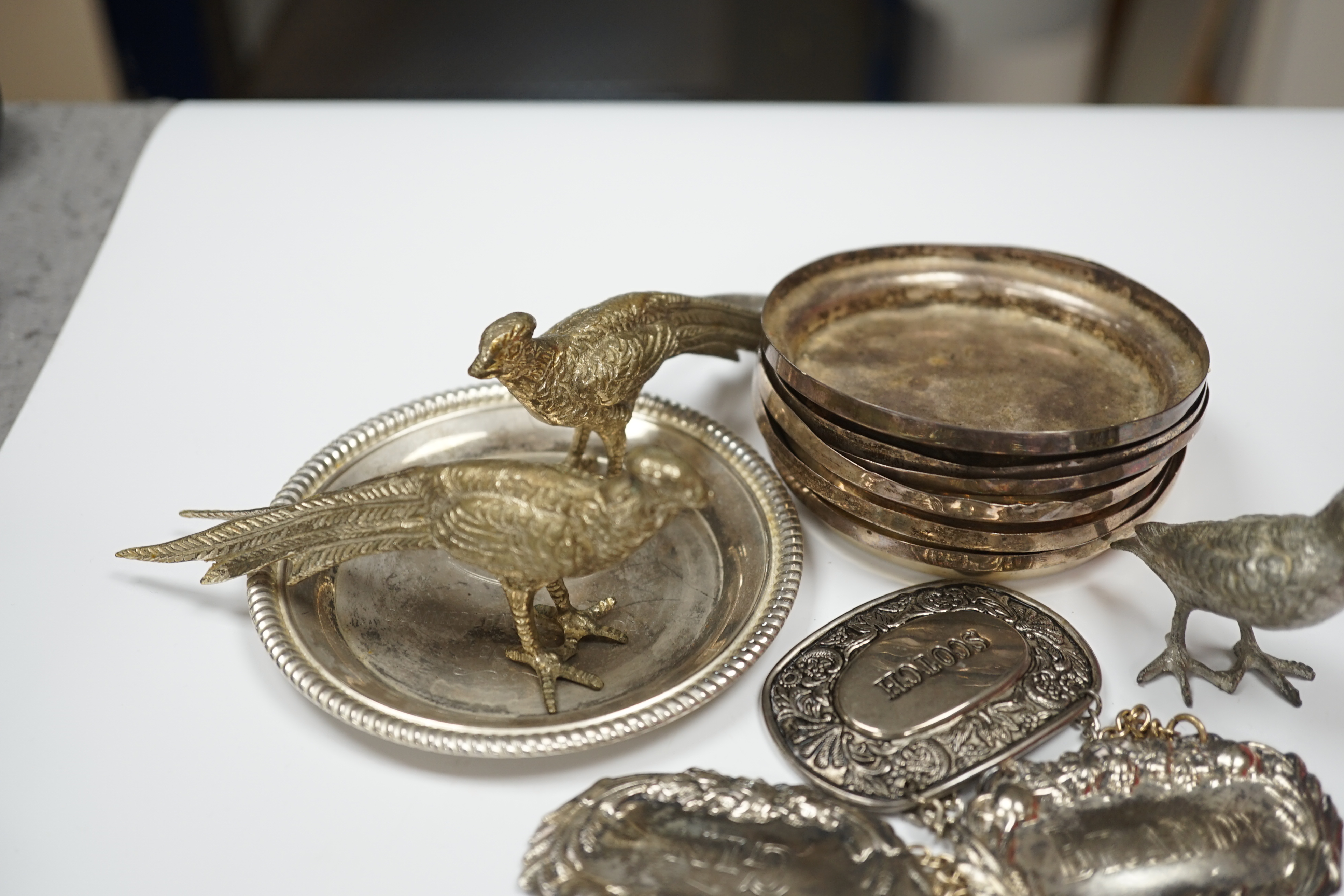 Mixed silver plate including cutlery, dishes, decanter labels and model pheasants